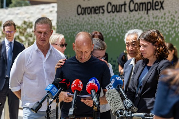 Kerrie Good (left), father of Ashley Good, and Noel McLaughlin (centre), fiance of victim Jade Young, speak outside the coroners court.