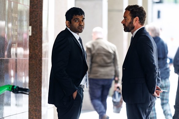 Sharangan Maheswaran, left, with his lawyer outside the ICAC. 