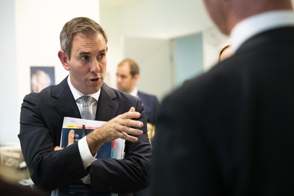 Treasurer Jim Chalmers talks to reporters during the budget lock-up.  