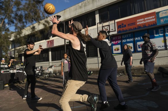 Shooting hoops at the Street University block party in Mt Druitt. 