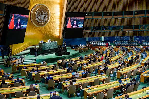 Chinese President Xi Jinping is seen on a video screen at the UN in September. 