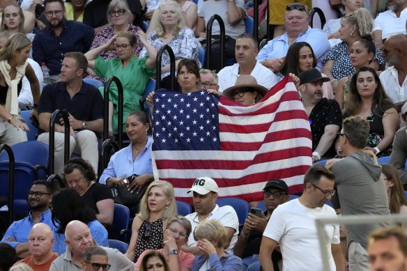 Supporters of Tommy Paul of the U.S. hold the American flag at the semifinal against Novak Djokovic of Serbia in 2023.