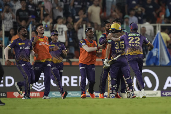 Rinku Singh and his Kolkata Knight Riders teammates celebrate their remarkable victory.