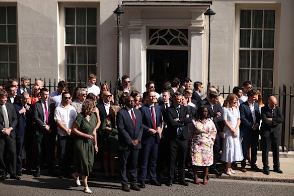 Ministerial staff gathered ahead of an announcement at Downing Street.