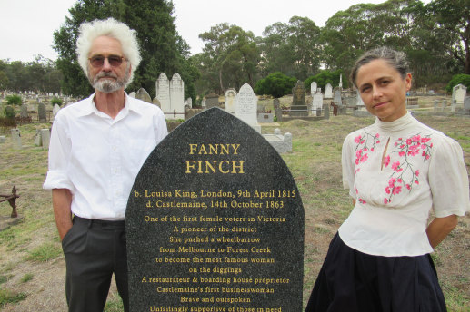 Bill Garner and his daughter Alice Garner at the grave of their ancestor Fanny Finch.