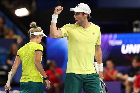 Matt Ebden celebrates a point in his mixed doubles rubber with Storm Hunter. The pair beat Jessica Pegula and Rajeev Ram of the USA.