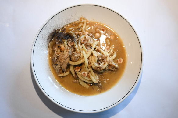Hand-rolled pici pasta with cockerel and hazelnuts at Saint George. 
