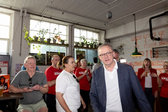 Labor volunteers greeted Albanese the day after his landslide election victory.