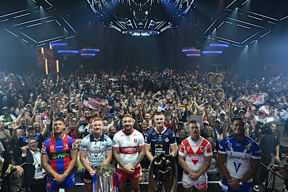 Captains of the four NRL teams and two Super League sides in Las Vegas pose before the crowd at the nightclub launch.