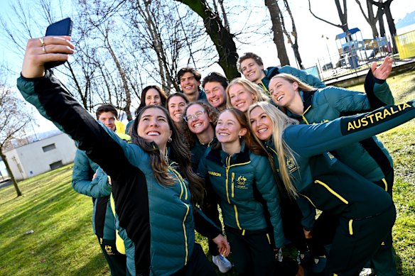 Monobob athlete Bree Walker takes a photo with other members of Australia’s 2026 Olympic team. 