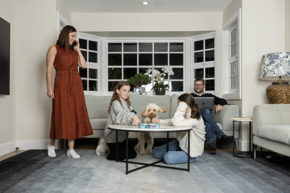 Tamara Lawless, Addison, Grace and Michael Lawless with dog Alfie at their home in Forestville. 