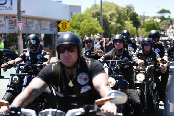 Hundreds of bikies leave the funeral home in North Perth.