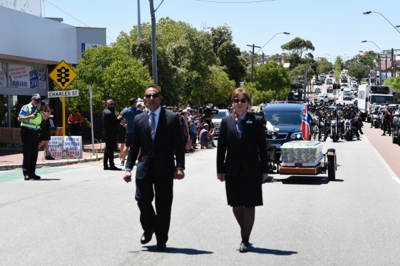 The procession makes its way from the North Perth funeral home. 