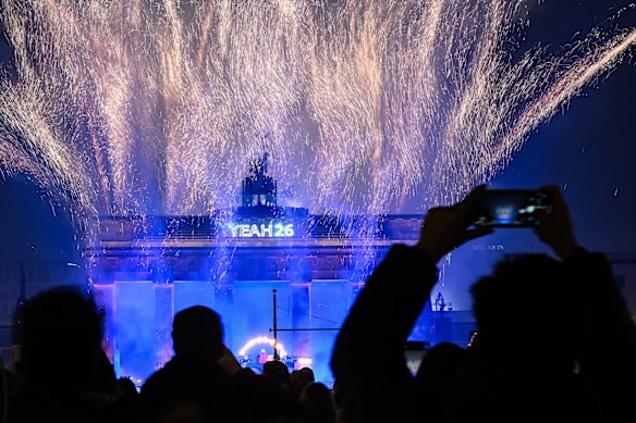 Fireworks burst above the Brandenburg Gate in Berlin.