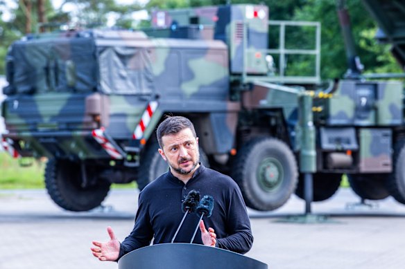 Ukrainian President Volodymyr Zelensky, shown here with Patriot missiles last year, is seeking more air defence systems.
