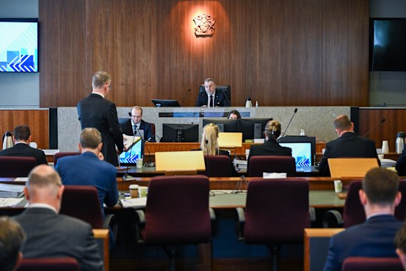 Commissioner Stuart Wood listens to senior counsel assisting Patrick Wheelahan during last month’s hearings.