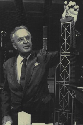 Sir Joh with a model of Brisbane Central, which would have been the world's tallest building.