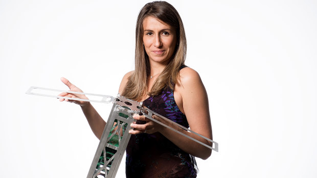 Fleet Space Technologies CEO Flavia Tata Nardini with one of the company's nano satellites.