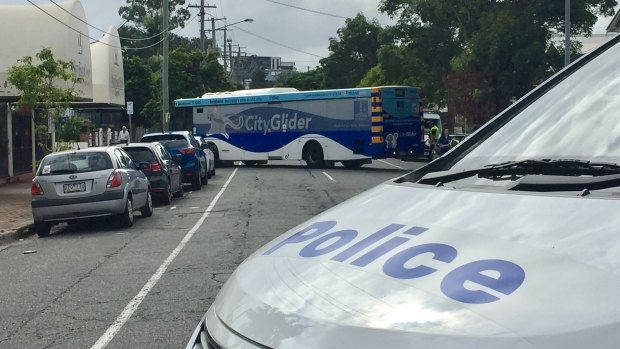 A council bus performs a challenging U-turn in West End after driving into a blocked street.