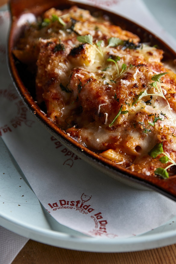 Penne al forno with pork sausage ragu.