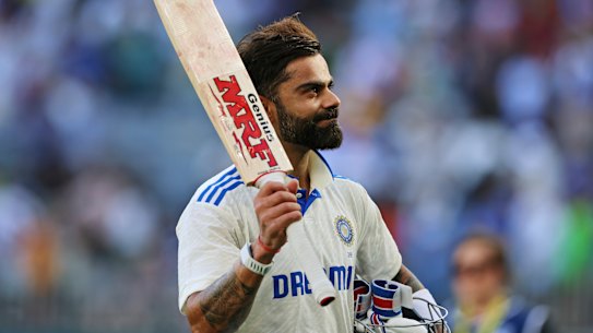 India’s Virat Kohli celebrates his century in Perth.
