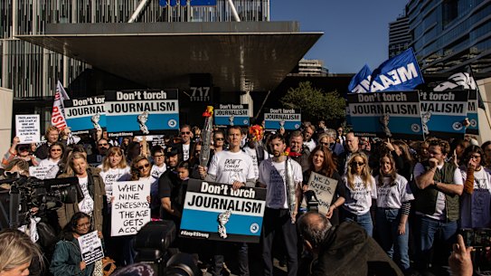 Striking workers outside Nine’s offices in Melbourne on Friday.