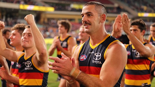 DELAIDE, AUSTRALIA - MAY 22: Taylor Walker of the Crows walks from the ground during the round 10 AFL match between the Adelaide Crows and the Melbourne Demons at Adelaide Oval on May 22, 2021 in Adelaide, Australia. (Photo by Daniel Kalisz/Getty Images)
