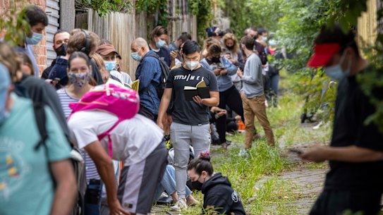 The queue on Tuesday for COVID-19 testing extended into an alleyway at a St Kilda east site, which was at capacity and forced to close half an hour before it was meant to open. 