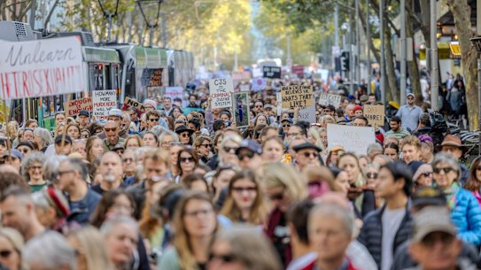 Protesters in Melbourne’s CBD rally on Sunday against gender-based violence,