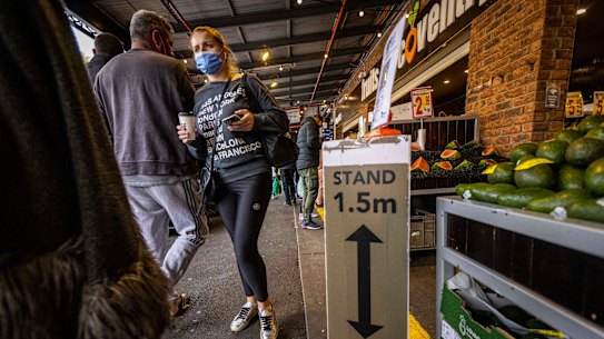Melburnians wearing masks around South Melbourne Market over the weekend. 