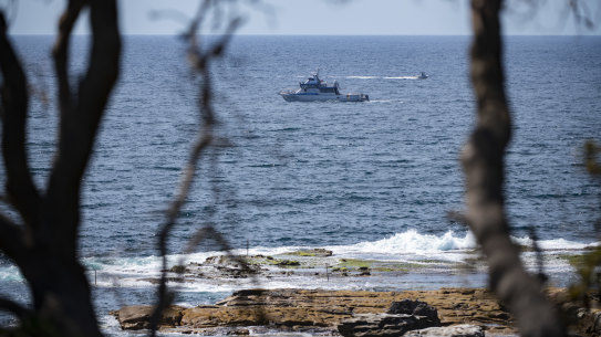 Authorities searched the waters around Little Bay on Thursday following Wednesday’s fatal shark attack.