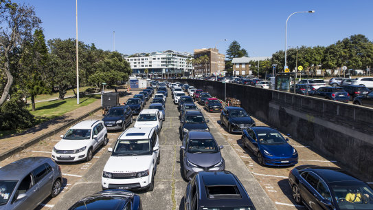 Long lines at St Vincent’s drive-through COVID testing clinic at Bondi Beach.