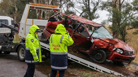 Police at the scene of a car crash where four teenagers were killed in Bochara.