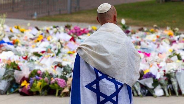 People gather at Bondi Pavilion to commemorate the victims of the shooting.