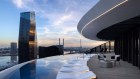 The wet-edge 28-metre pool atop the Melbourne Marriott Hotel Docklands is the hero of this new property.