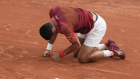 Serbia’s Novak Djokovic slipped and fell during his fourth round match, which he won.