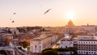Aerial view of Rome skyline at sunset.