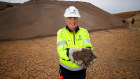 Iluka veteran Geoff Dyer in the pit where monazite containing rare earths has been stored for more than 30 years.