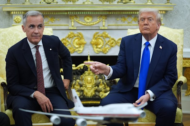 President Donald Trump and Canadian Prime Minister Mark Carney meet in the Oval Office of the White House,