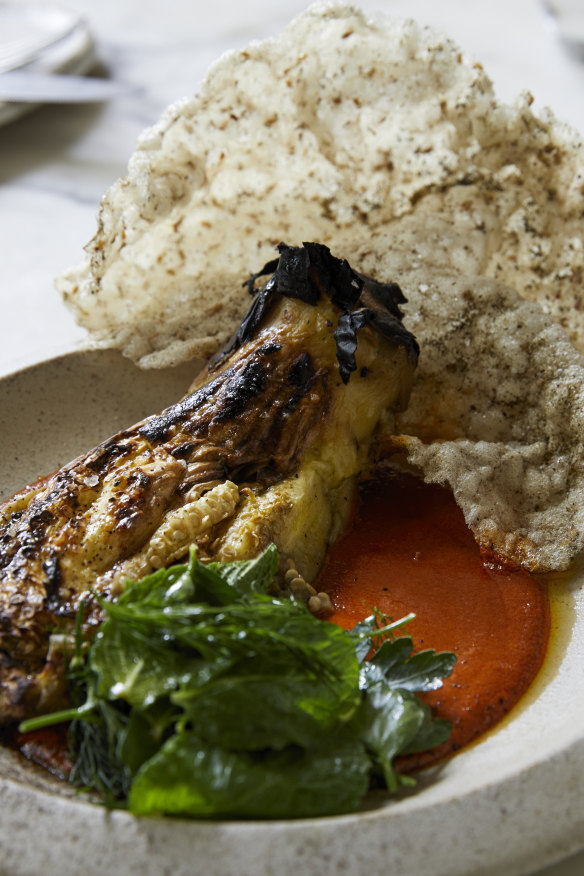 Wood-fired eggplant, filfil chouma, and zaatar crisp.