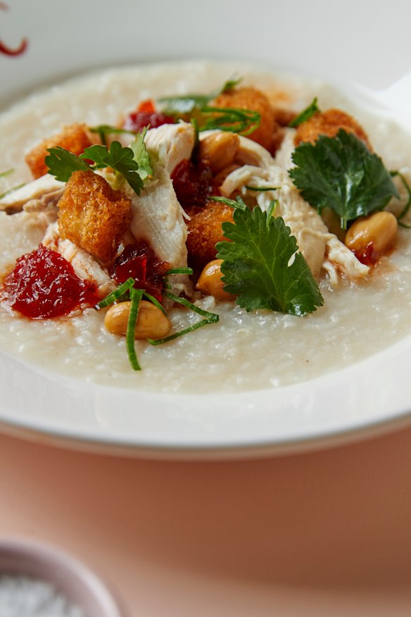 Congee with shredded roast chicken, peanuts, chilli and fried bread.