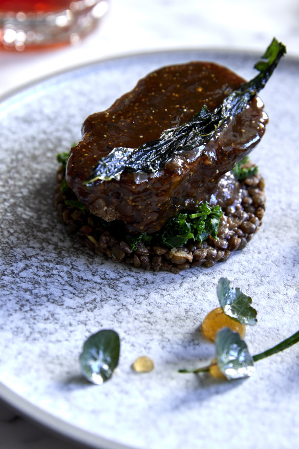 Beef cheek with blue lentils and Tuscan cabbage.