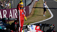 Lewis Hamilton of Britain celebrates after setting a pole position for the sprint race at the British F1 Grand Prix.