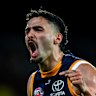 Izak Rankine of the Crows celebrates a goal.
