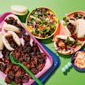 Store-bought bao and slaw transform glazed pork belly bites into a speedy weeknight dinner.