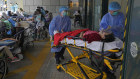 Patients at a temporary treatment area outside the Caritas Medical Centre in Hong Kong on Saturday.