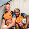 Tigers players Api Koroiusa and Alex Seyfarth celebrate the NRL’s Multicultural round.
