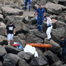 Emergency services by The Gravel Loader Dive Site on Saturday morning, where a man was declared dead.