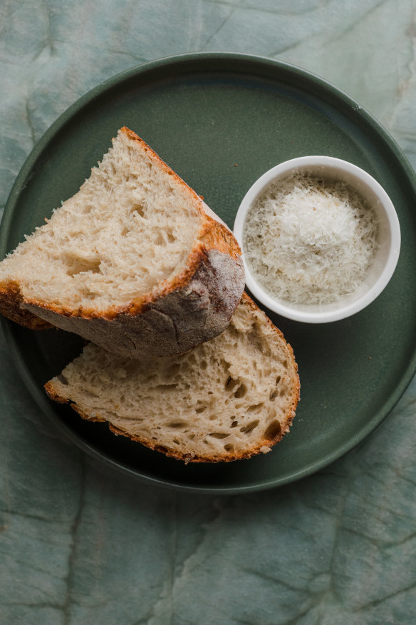 House-baked sourdough bread arrives free of charge.