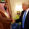 US President Donald Trump, right, shakes hands with Saudi Crown Prince Mohammed bin Salman in Riyadh in 2017. 
